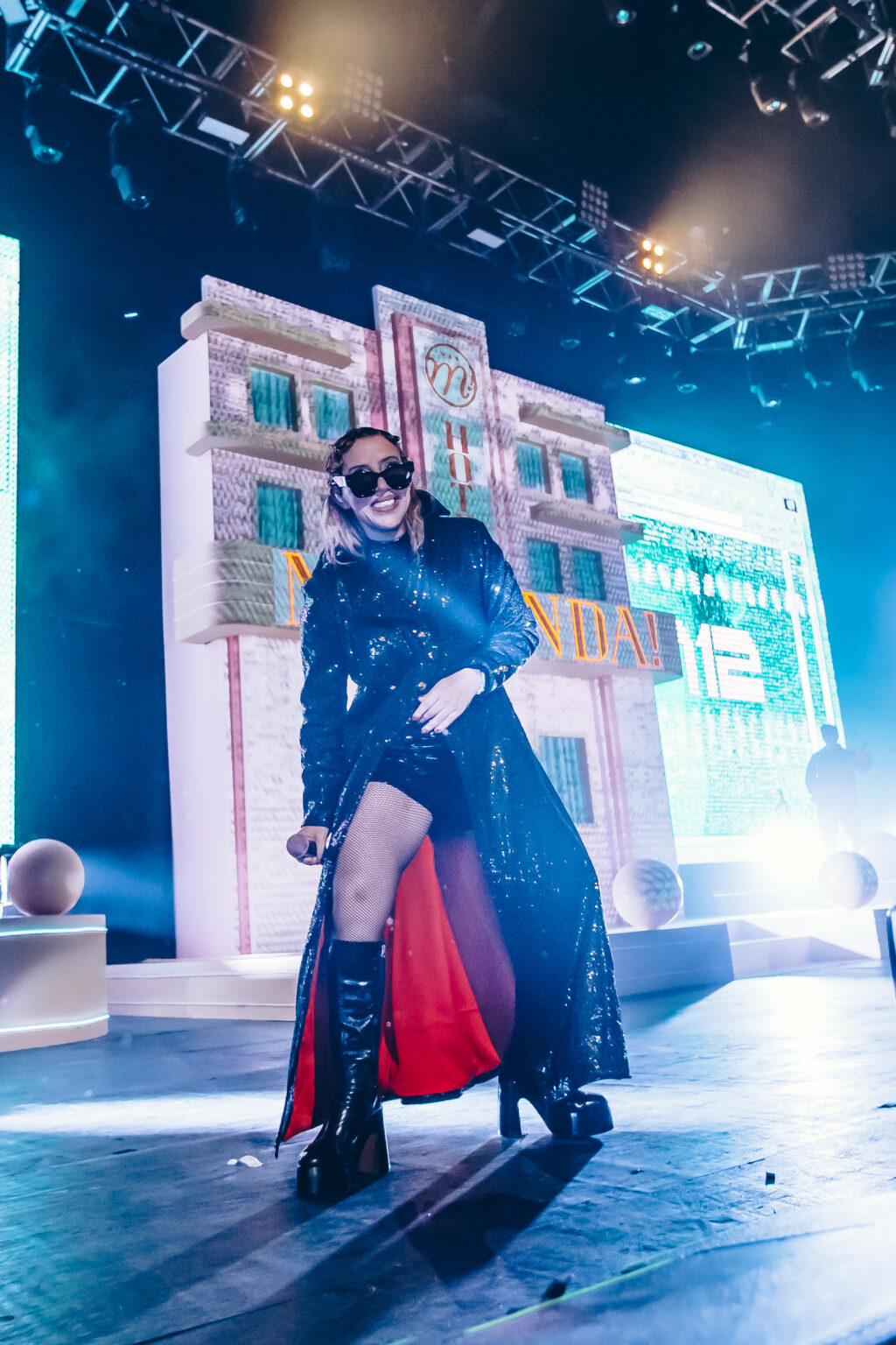 Singer in a red cape on the hotel stage set — Hotel Miranda! at Luna Park, Buenos Aires, 6 October 2023. Photographed by Anita Almaraz.