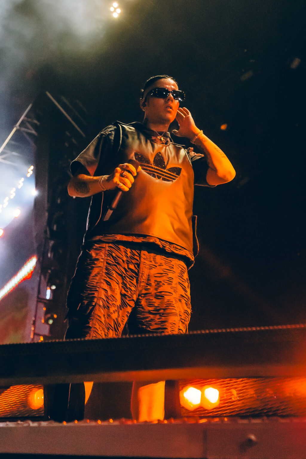 Duki singing with a hand to his chest — Duki at Estadio River Plate, Buenos Aires, 2 December 2023. Photographed by Anita Almaraz.