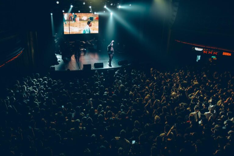 Wide view of the stage seen over the crowd — Zeballos presenting Asimetría at Vorterix, Buenos Aires, 2026. Photographed by Anita Almaraz.