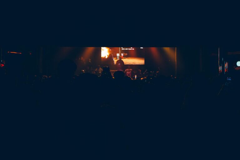 Wide view of the darkened stage — Zeballos presenting Asimetría at Vorterix, Buenos Aires, 2026. Photographed by Anita Almaraz.