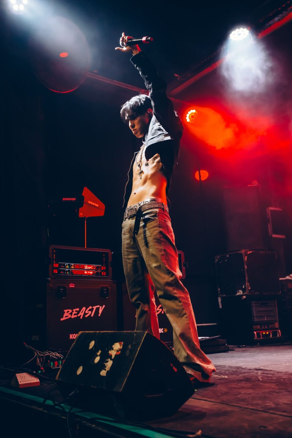 Performer with an arm raised in the stage smoke — Way Better at Club Cultural Matienzo, Buenos Aires, 2026. Photographed by Anita Almaraz.