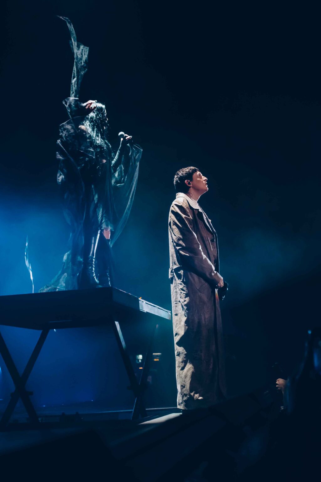 Dillom face to face with the hooded figure — Dillom at Estadio Luna Park, Buenos Aires, 19 June 2024. Photographed by Anita Almaraz.